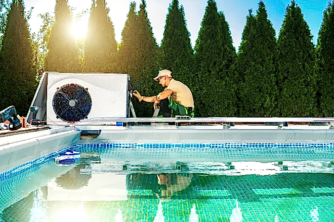 A technician repairing a pool